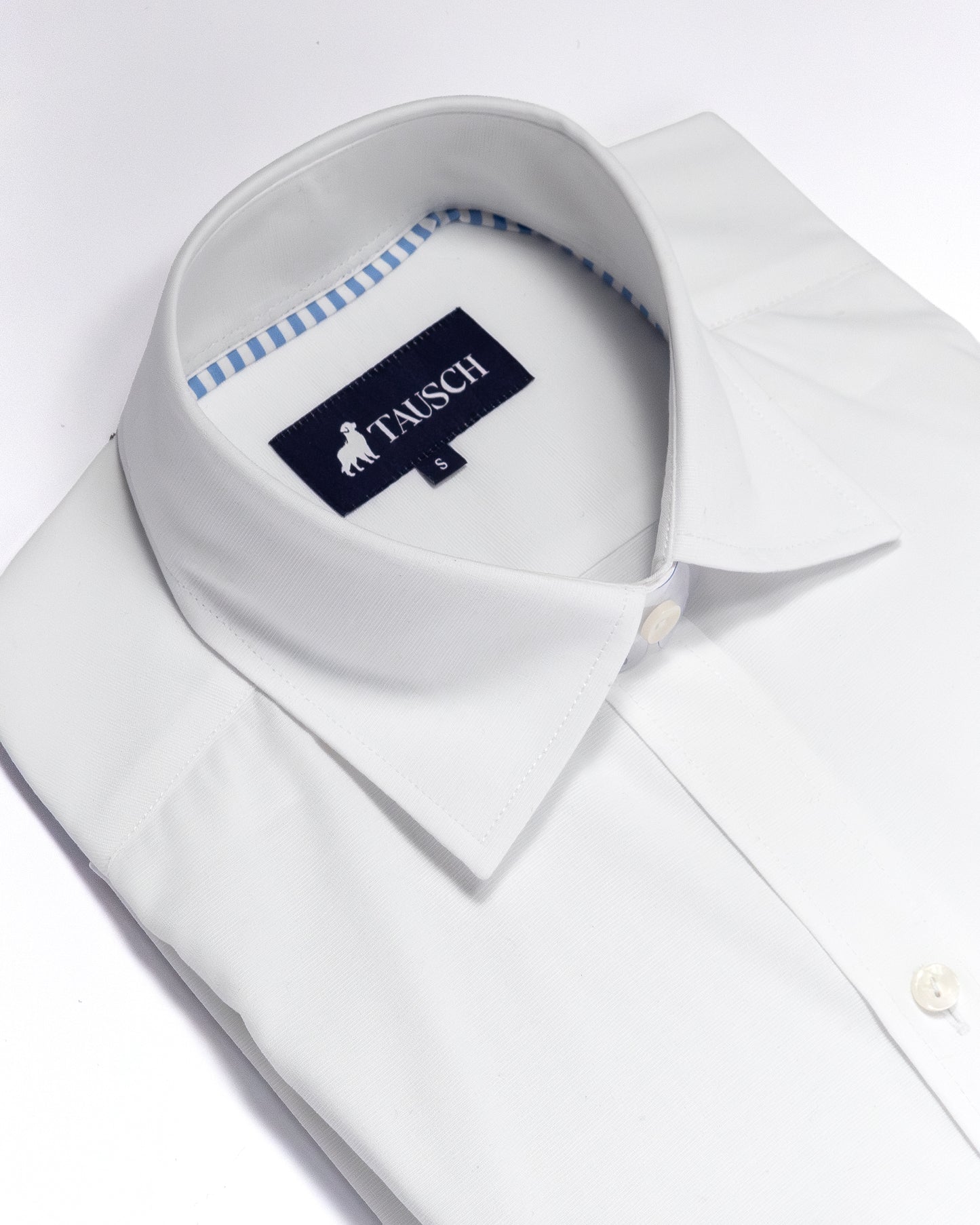BLUSA BLANCA CONTRASTE HUELLAS AZUL